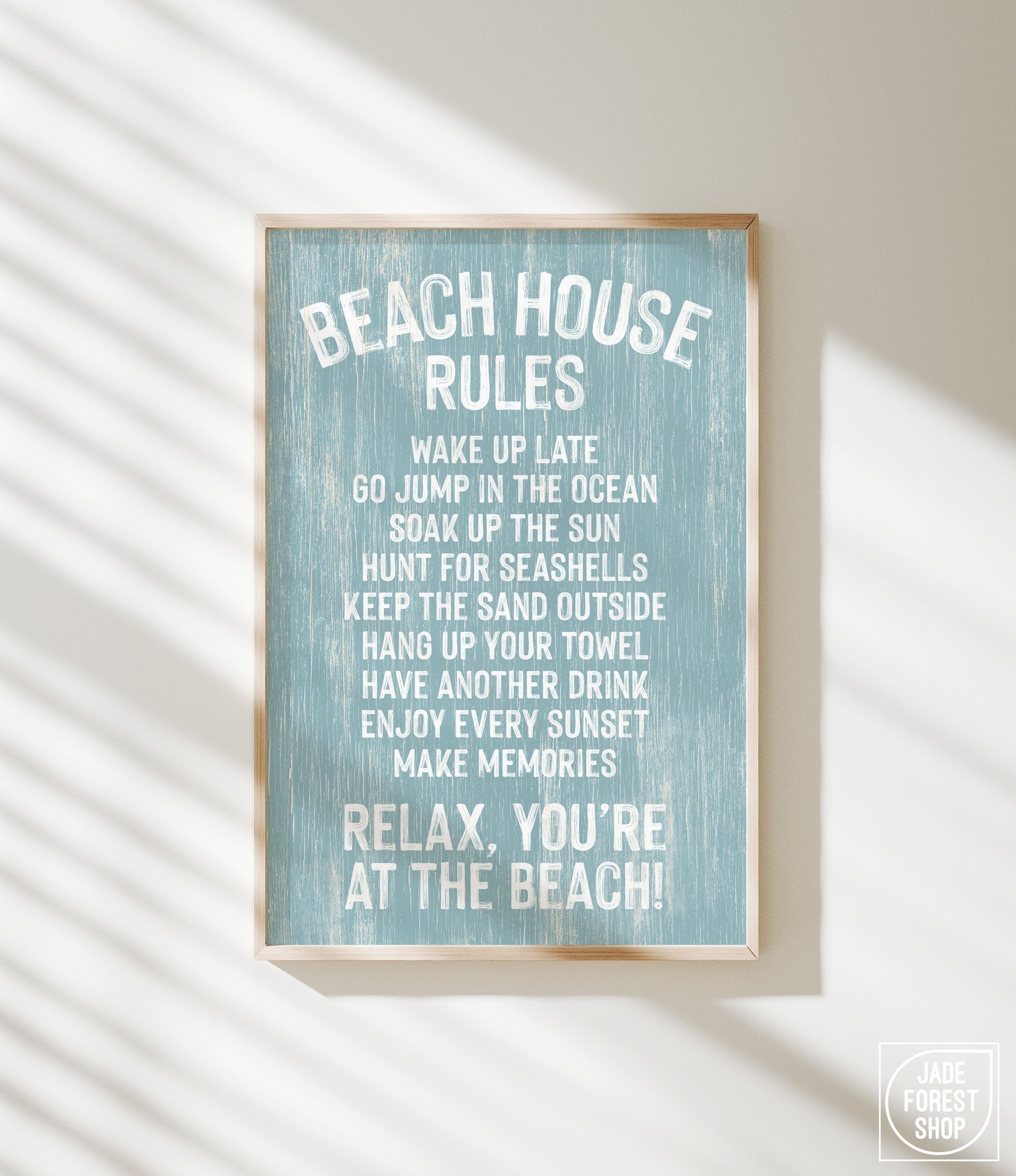 The Beach House Rules Sign, Painted Wood, Tide features fun guidelines on a blue background—sunlit and perfect as coastal wall art.