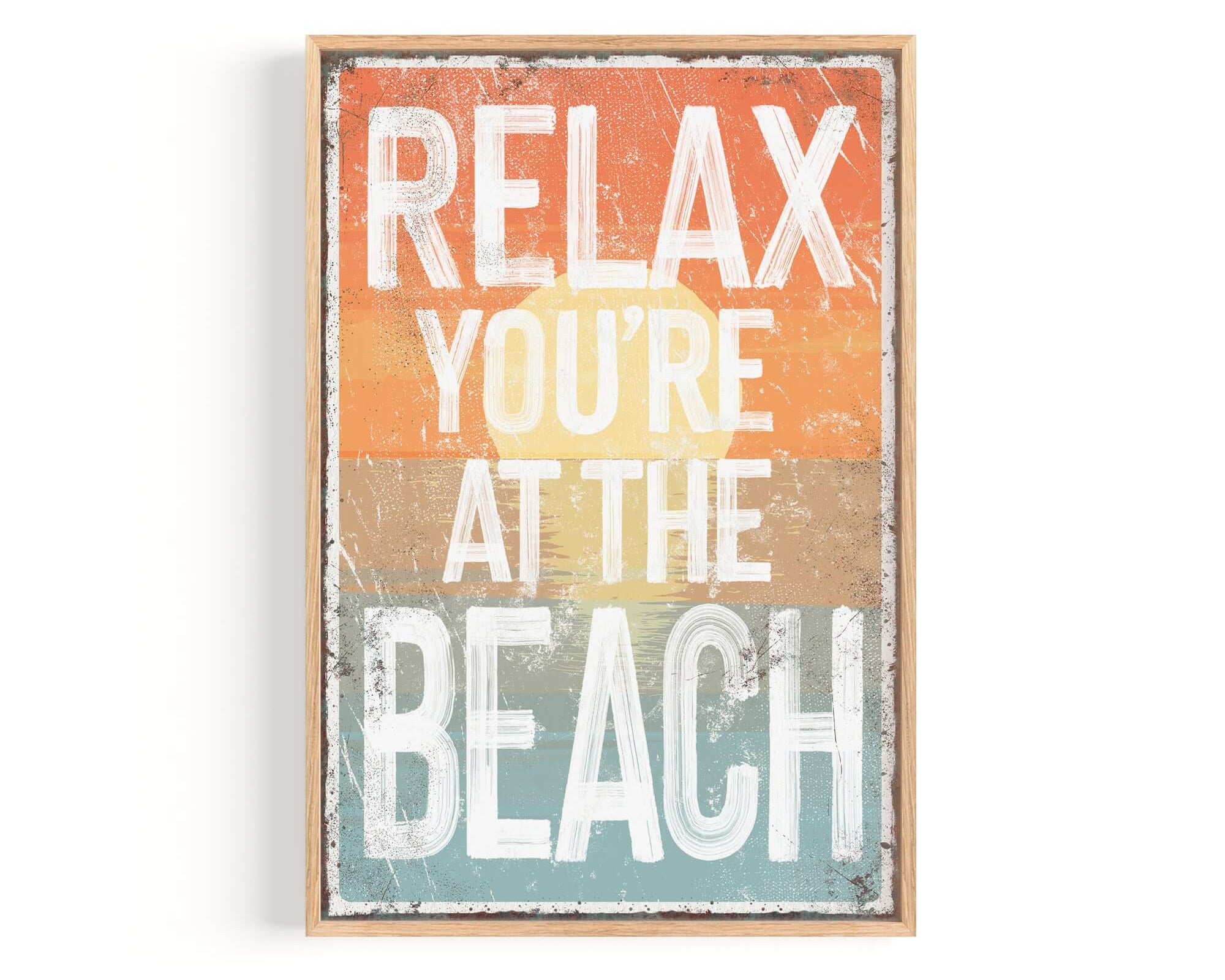 a sign that says relax you're at the beach