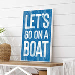 a blue sign that says let&#39;s go on a boat