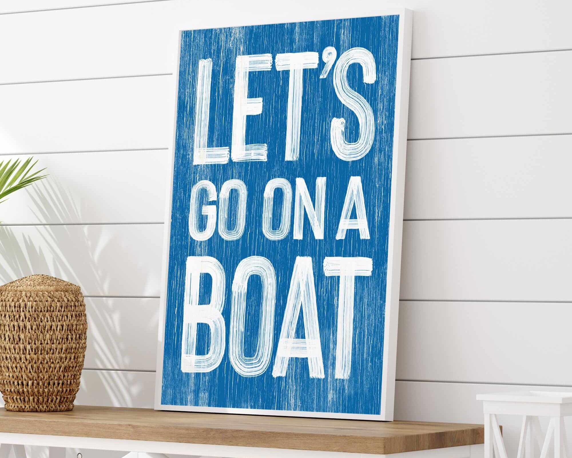 a blue sign that says let's go on a boat