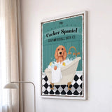 A framed poster of a Cocker Spaniel dog sitting in a bathtub, surrounded by bubbles, is displayed on a wall.