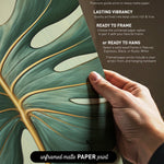 The image is a hand holding a piece of paper with a close-up view of a green leaf with gold lines, and the text provides information about the paper print options.