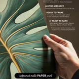 The image is a hand holding a piece of paper with a close-up view of a green leaf with gold lines, and the text provides information about the paper print options.