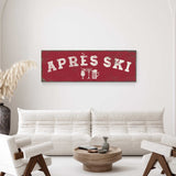 a living room with a white sofa and two chairs. Above the sofa, there is a red sign with the text "APRES SKI" and some icons representing drinks and a snowflake.