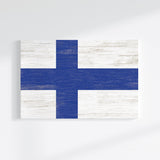 a piece of wood with a flag painted on it