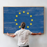 a man standing in front of a painting with stars on it