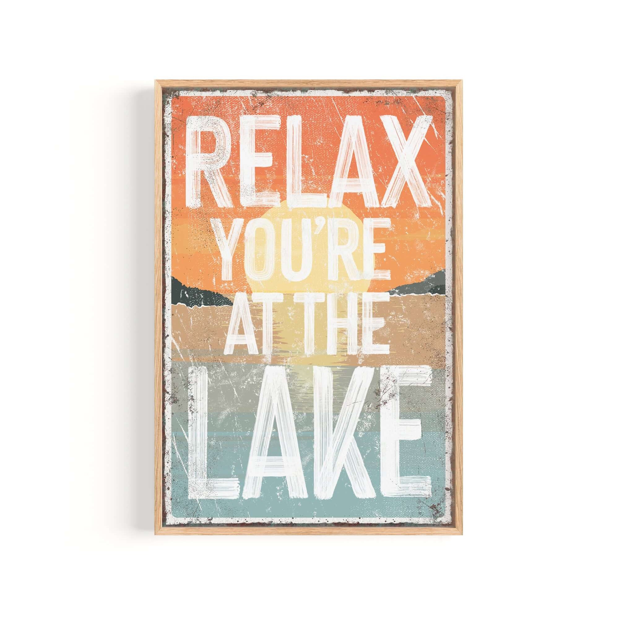 a sign that says relax you're at the lake
