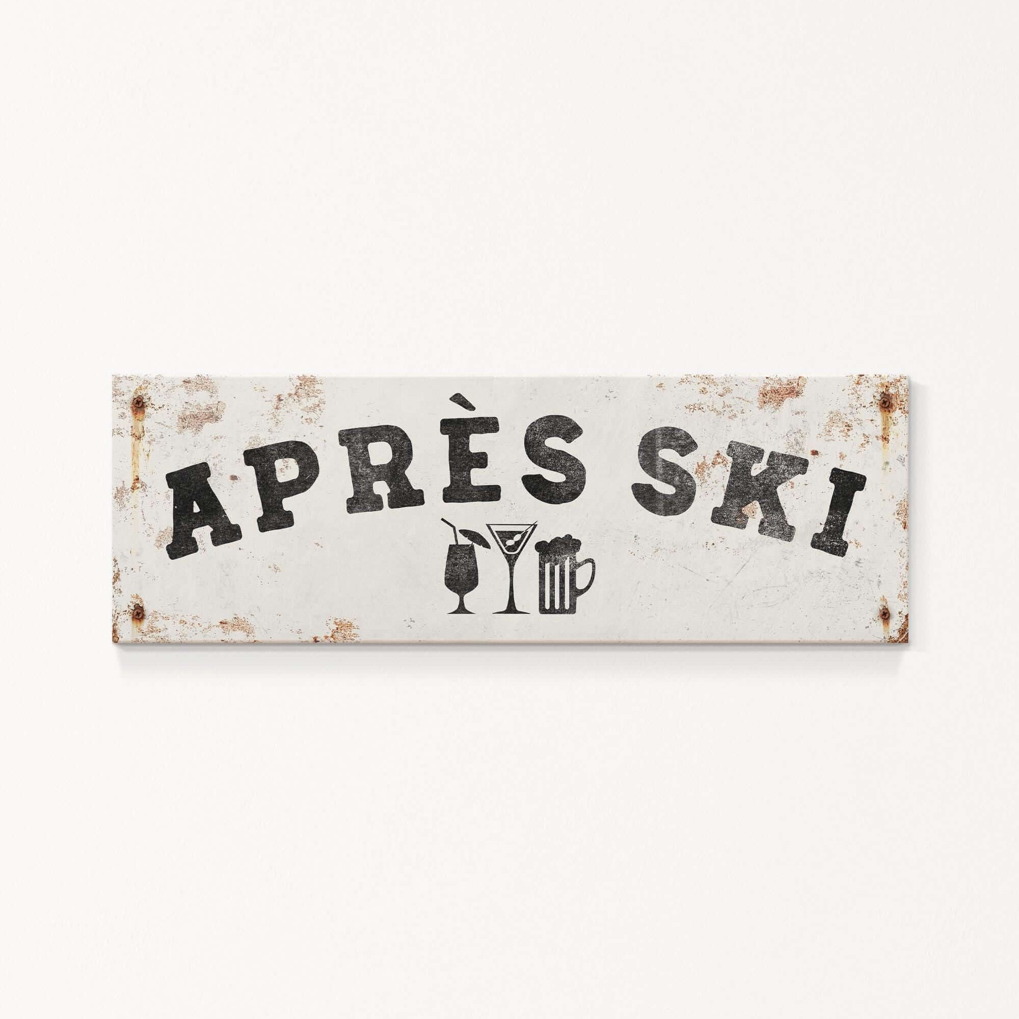 A weathered sign with the text "APRÈS SKI" and icons of a beer mug and a martini glass.
