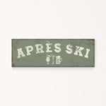A green rectangular sign with the text "APRÈS SKI" in white letters.