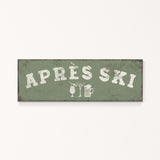 A green rectangular sign with the text "APRÈS SKI" in white letters.