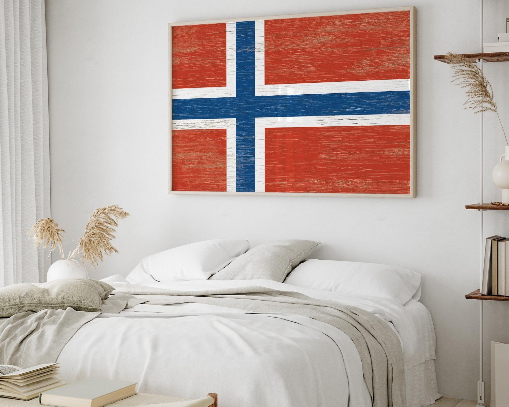 a bedroom with a bed and a painting on the wall