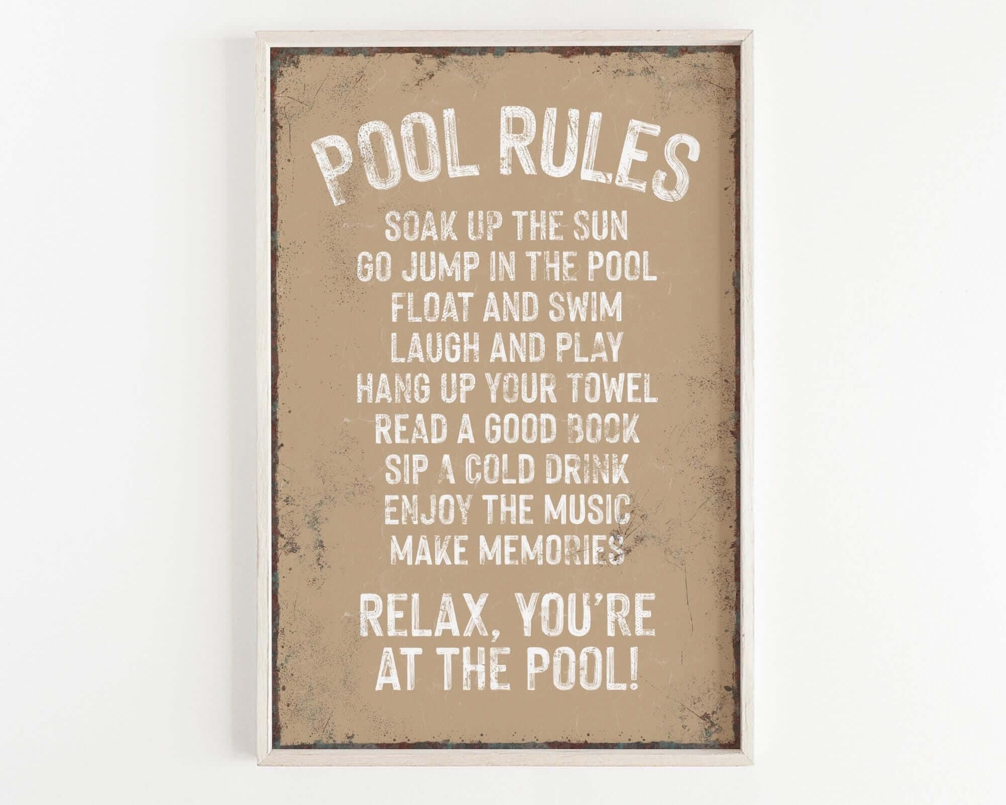 a sign that says pool rules hanging on a wall