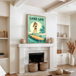 a living room with a fireplace, a poster of a woman paddleboarding, and various decorative elements such as baskets and a potted plant.