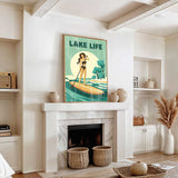 a living room with a fireplace, a poster of a woman paddleboarding, and various decorative elements such as baskets and a potted plant.