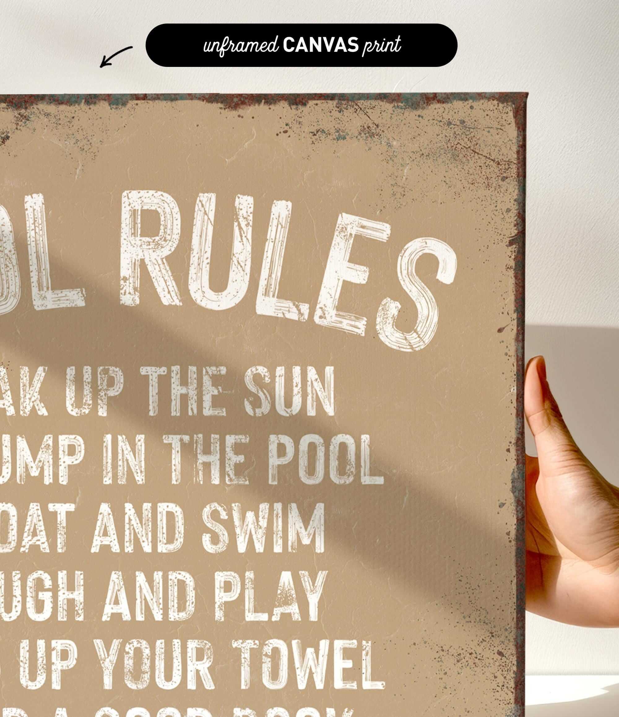 a hand holding a sign that says pool rules