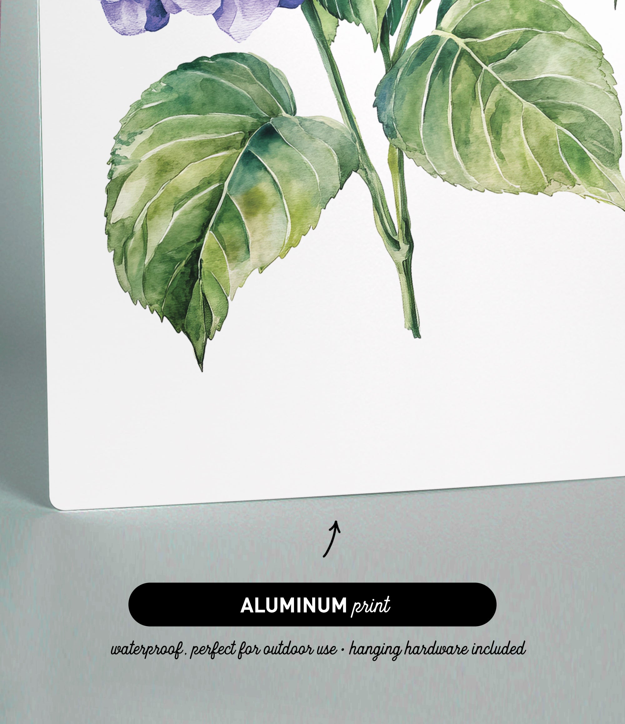 The image is an aluminum print featuring a watercolor painting of a green leaf and a purple flower.