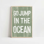 a green and white poster with the words go jump in the ocean