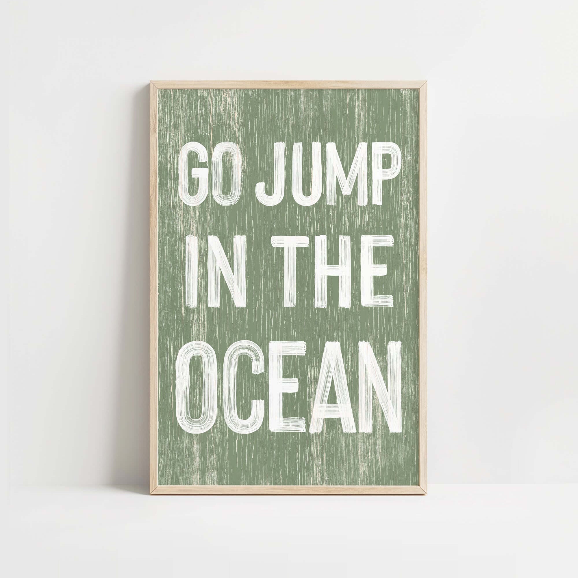 a green and white poster with the words go jump in the ocean