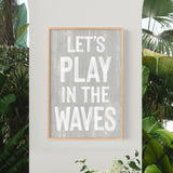 a sign that says let&#39;s play in the waves