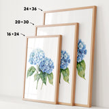 three framed watercolor paintings of blue hydrangea flowers, each with a different size and frame.