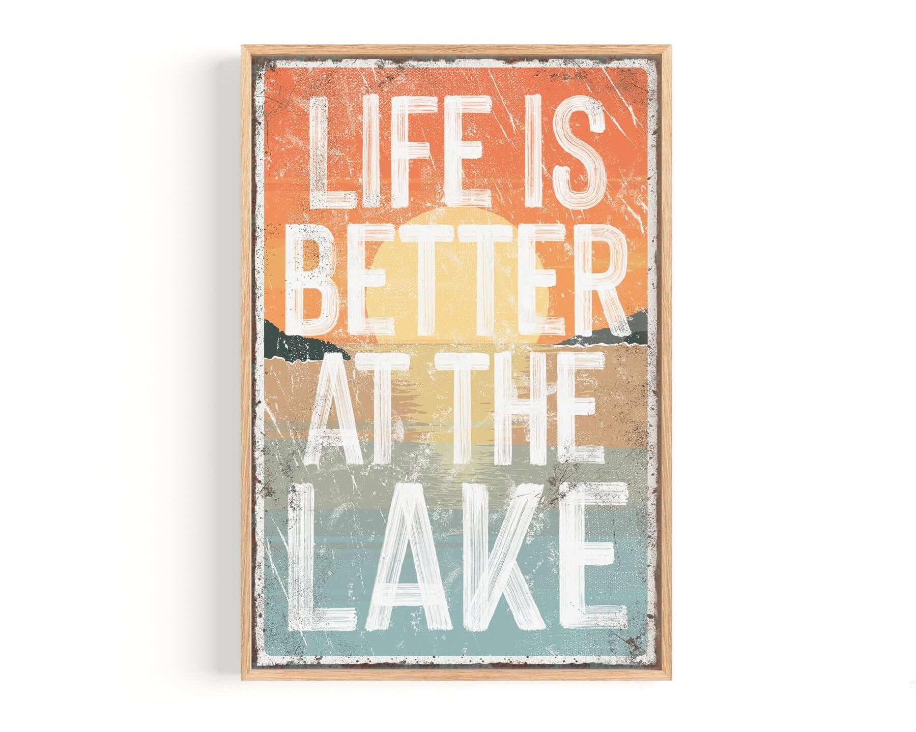 a picture of a sign that says life is better at the lake