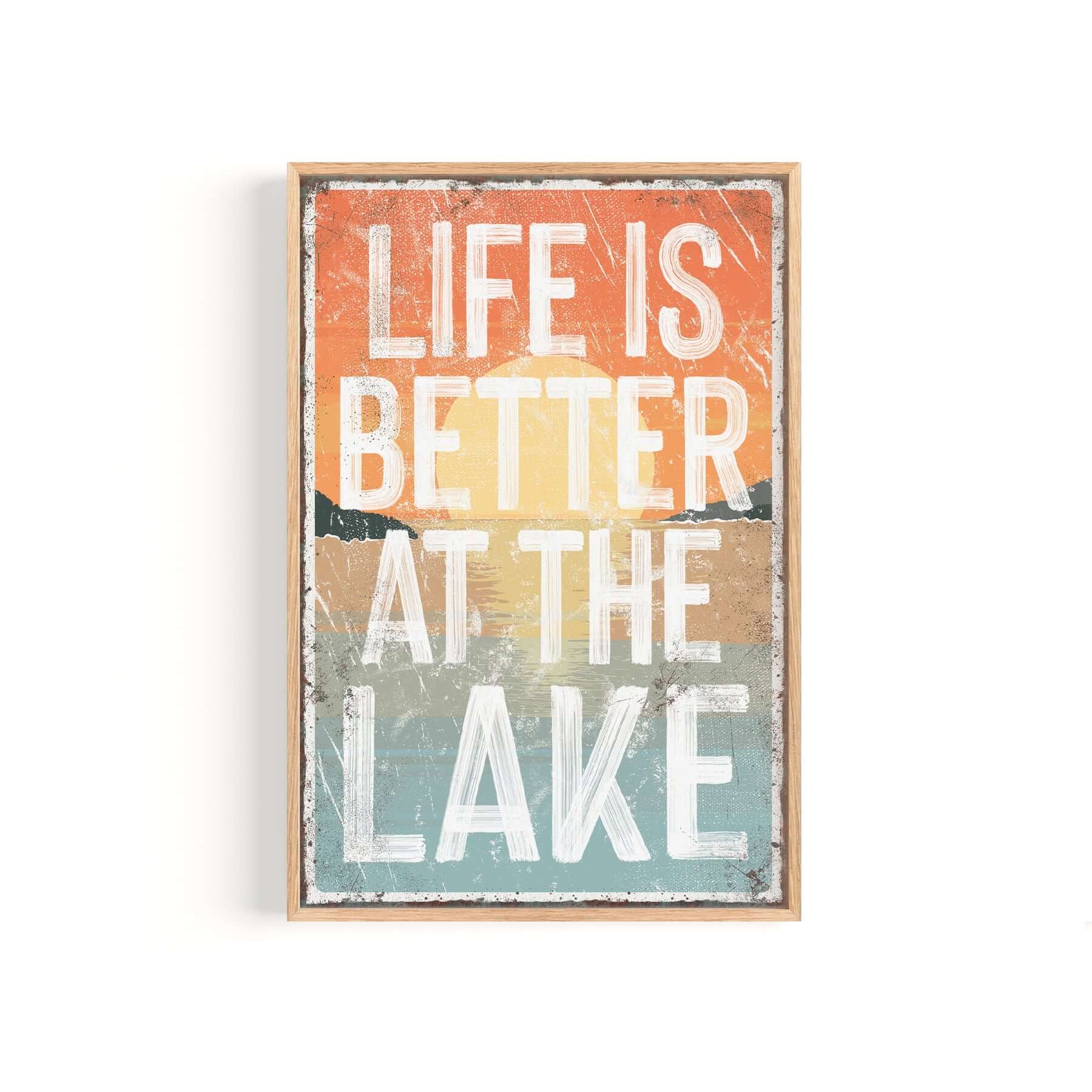 a picture of a sign that says life is better at the lake