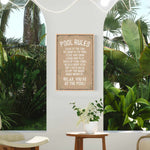 a picture of a pool rules sign hanging on a wall