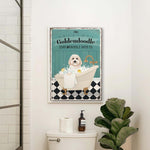 a bathroom with a toilet and a poster on the wall
