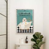 a bathroom with a toilet and a poster on the wall