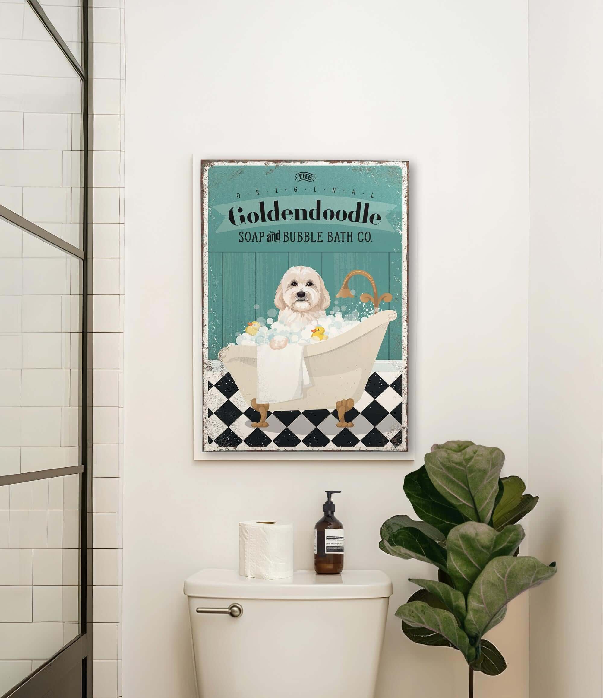 a bathroom with a toilet and a poster on the wall