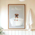 A framed poster with a cartoon image of a dog sitting in a bathtub, surrounded by bubbles, with the text "WASH YOUR PAWS" displayed above it.