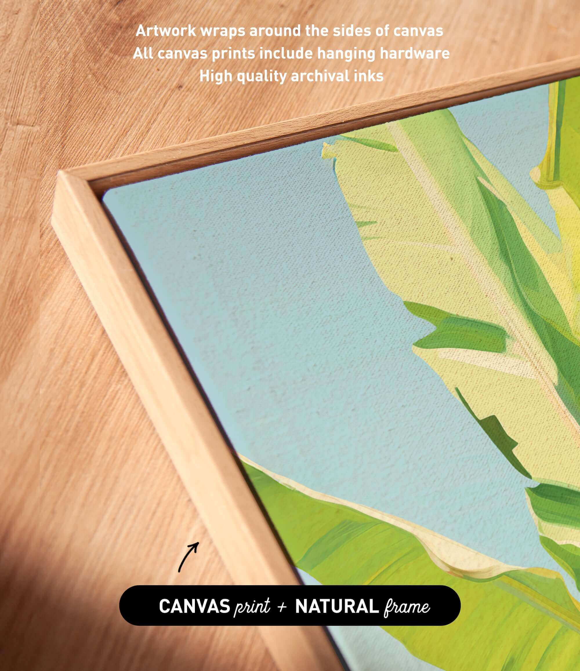 a close-up view of a framed artwork with a vibrant green and yellow tropical plant depicted on the canvas.