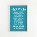 a picture of a pool rules sign hanging on a wall