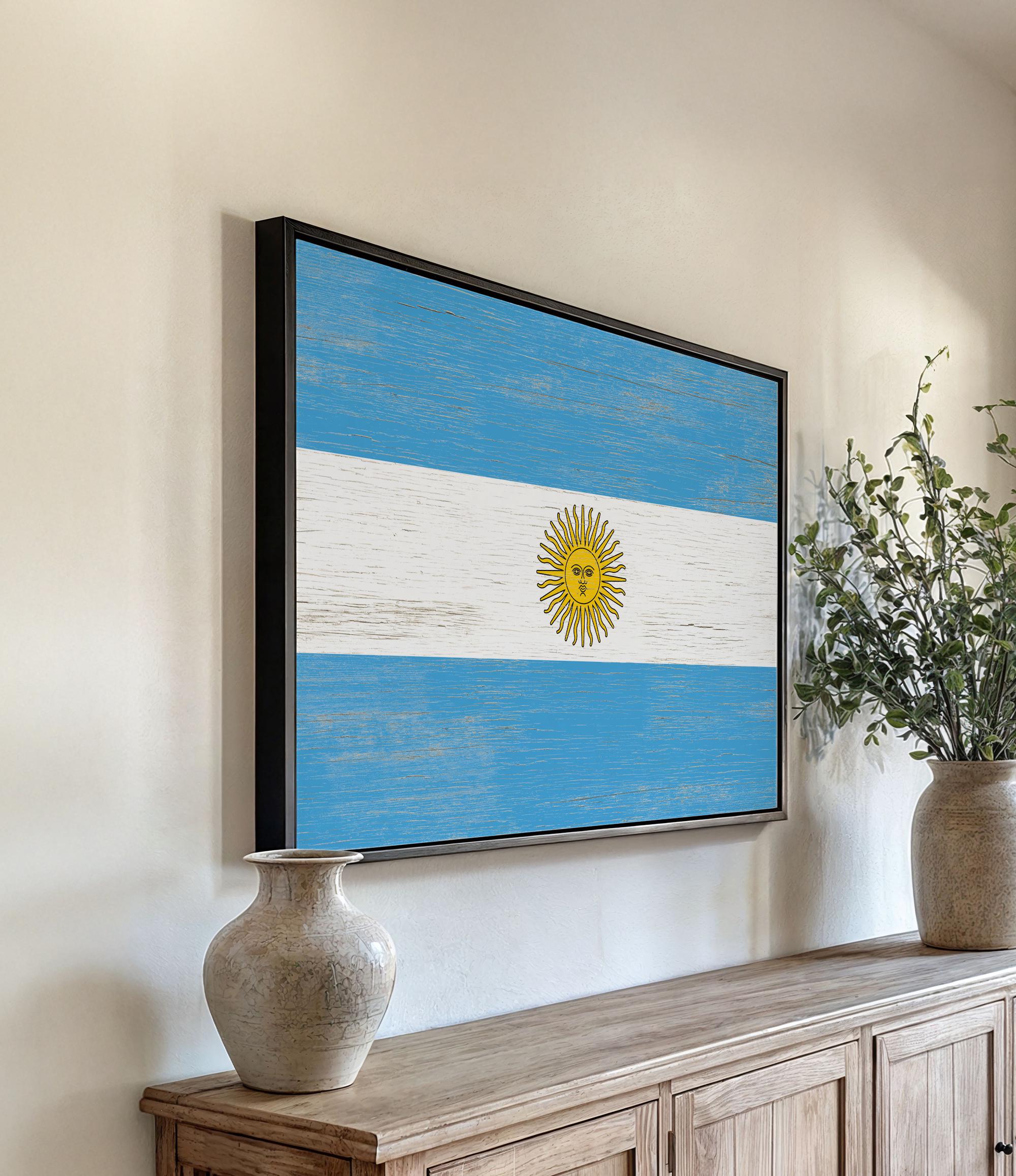 a painting of the flag of argentina hangs on a wall