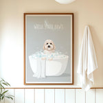 A framed poster with a dog sitting in a bathtub filled with bubbles, accompanied by the text "WASH YOUR PAWS" on the poster.