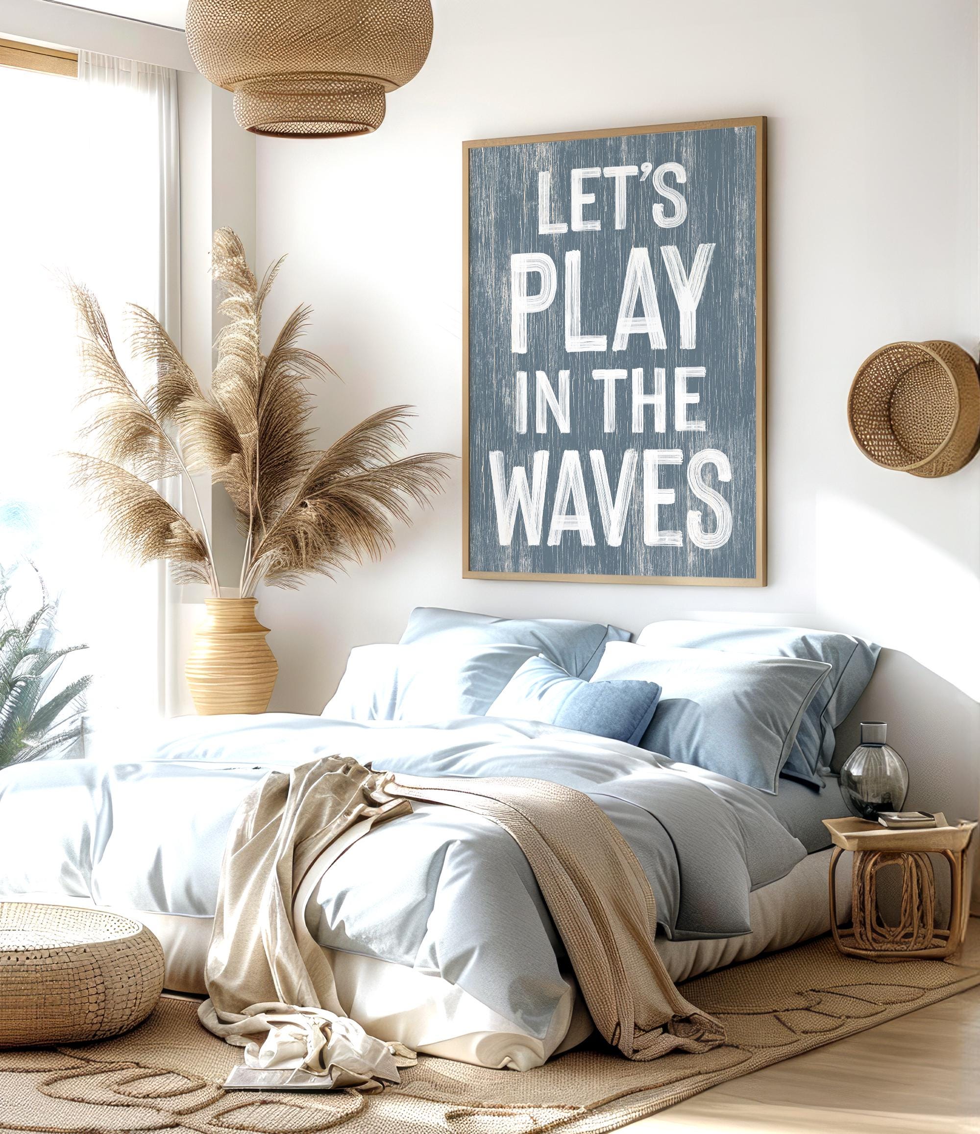 a bedroom with a large bed and a poster on the wall