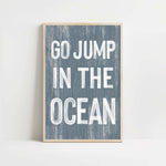 a blue and white print with the words go jump in the ocean