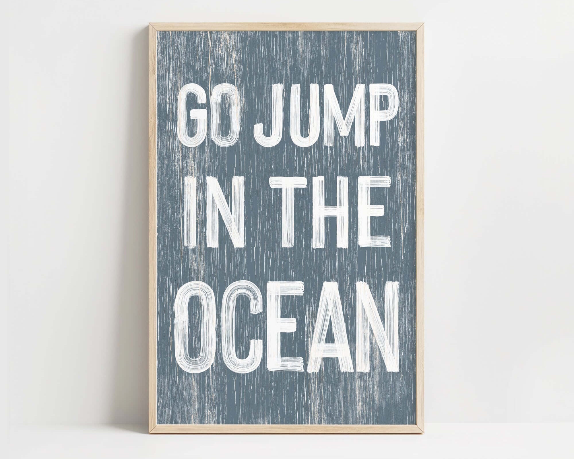 a blue and white print with the words go jump in the ocean