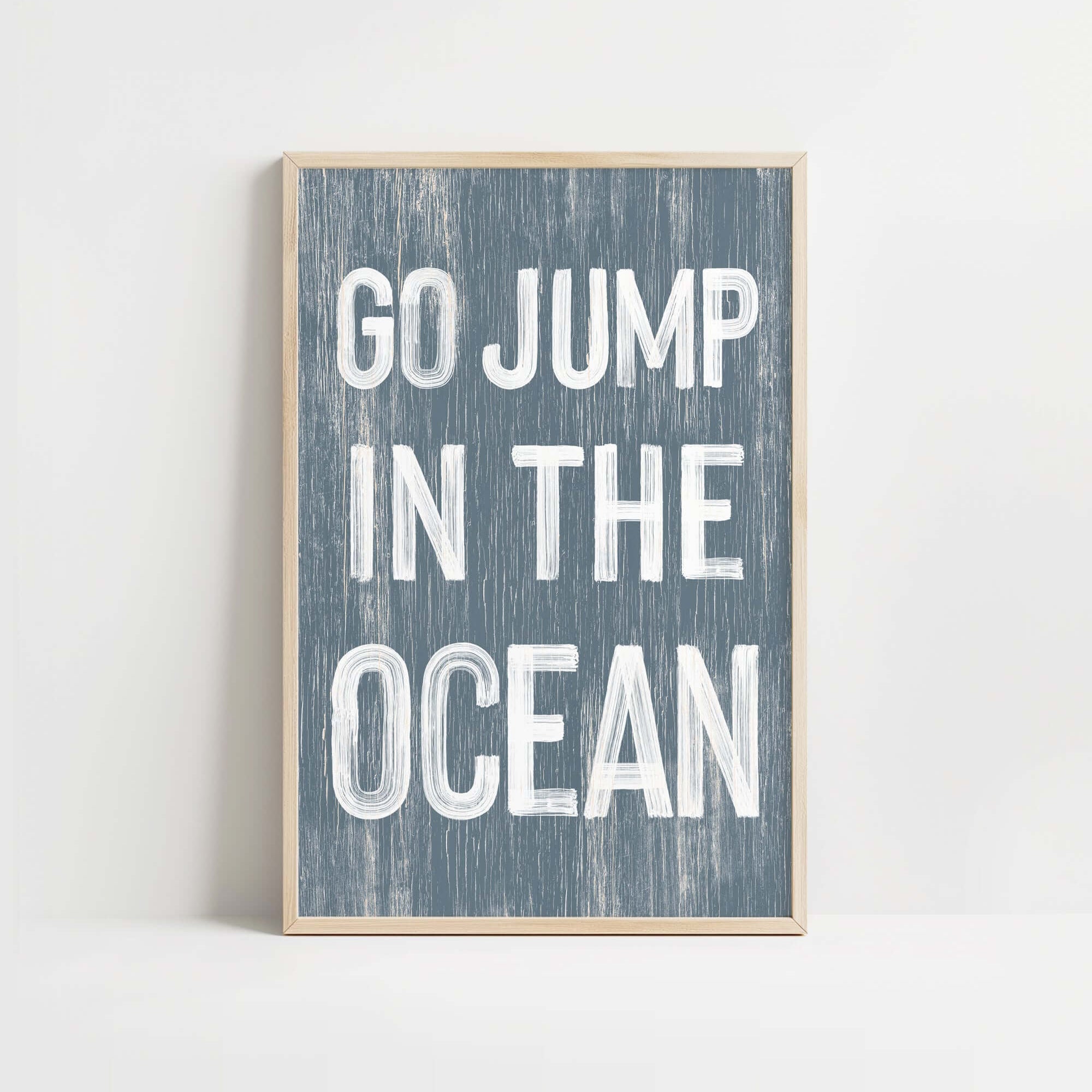 a blue and white print with the words go jump in the ocean
