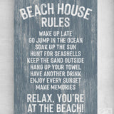 Add a coastal vibe to your decor with the Beach House Rules Sign, Painted Wood, Harbor Blue—a charming blue wooden sign with playful white text and "Relax, you're at the beach!" at the end.