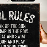 a hand holding a sign that says oil rules