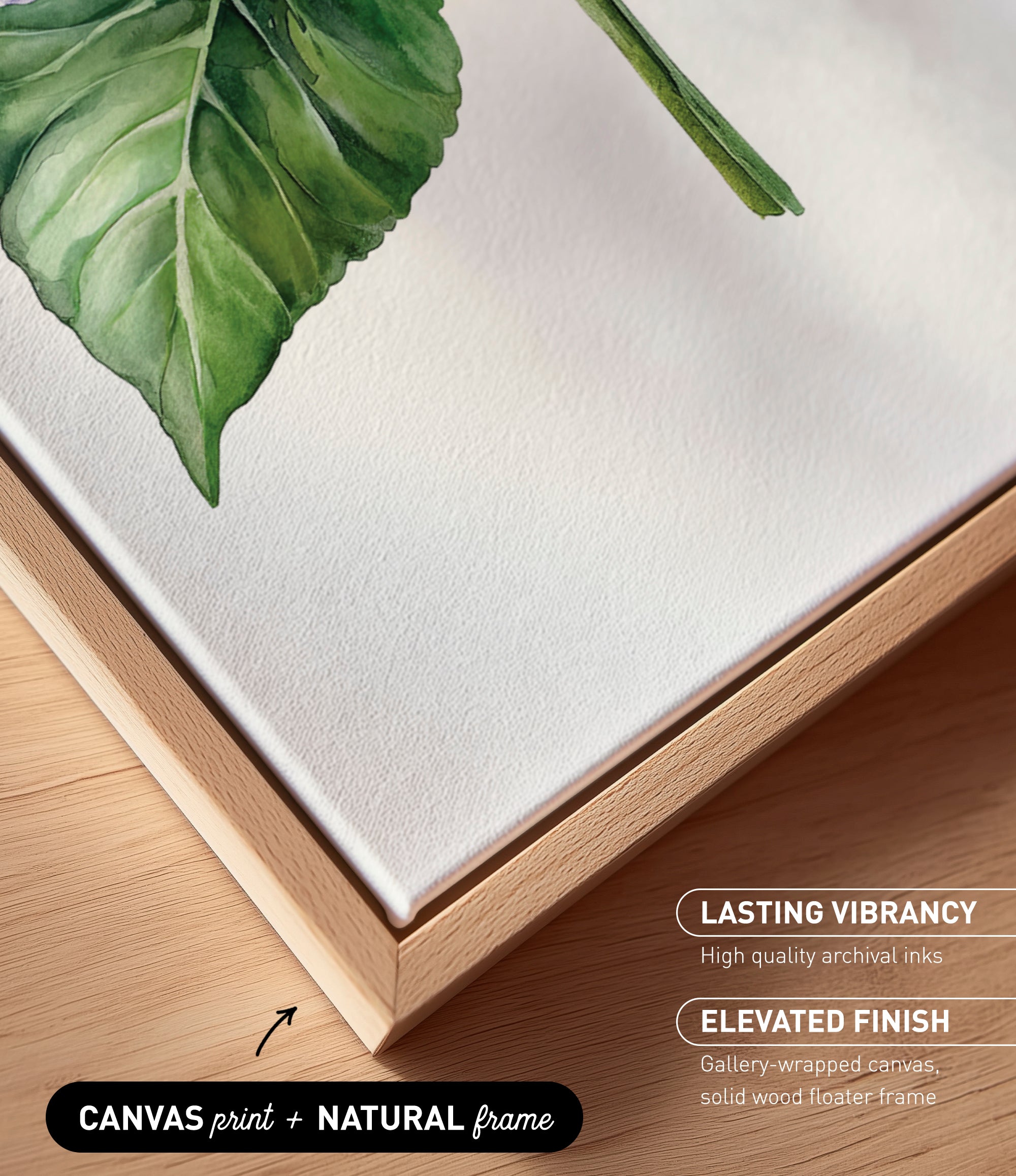 a close-up view of a canvas print with a natural frame, showcasing a vibrant green leaf on a white background.