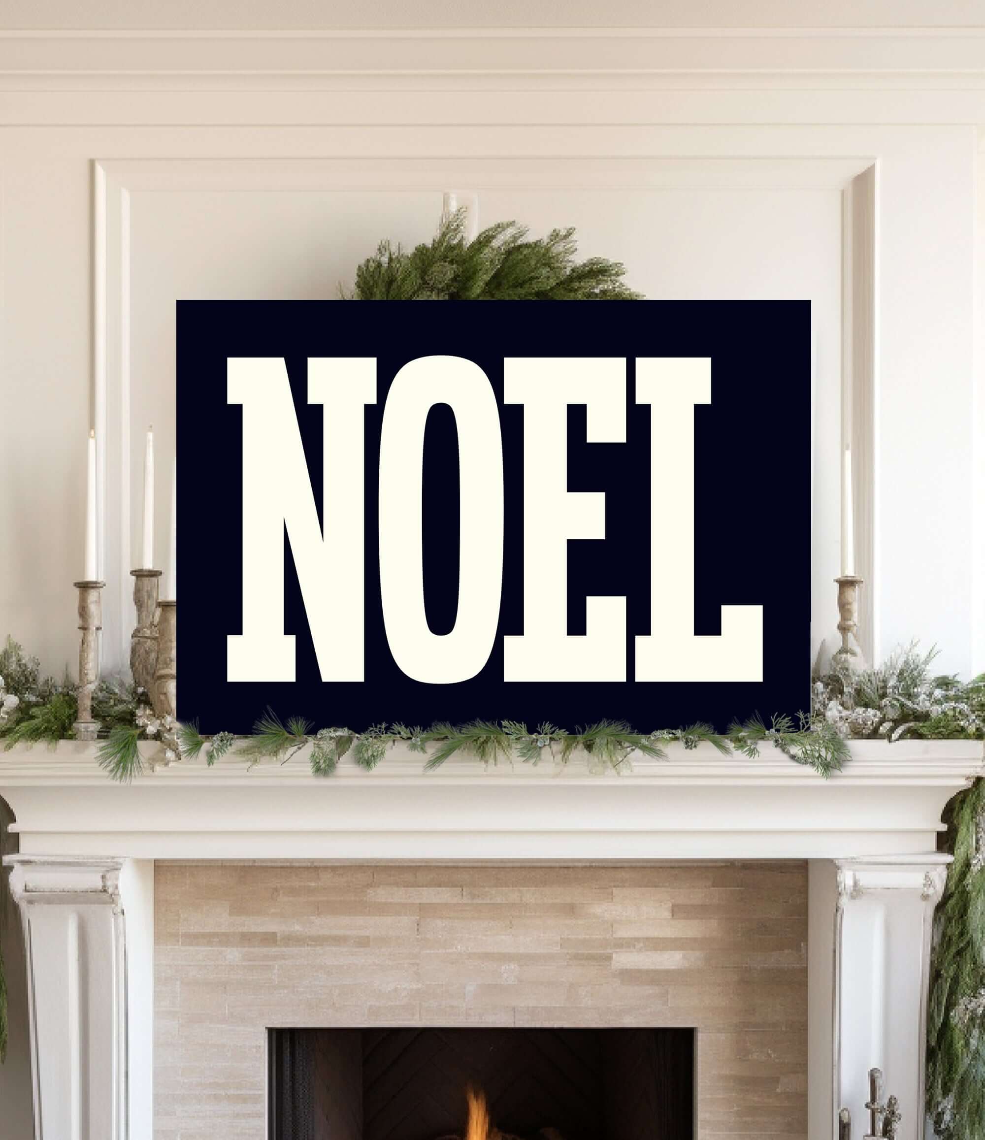 a fireplace with a sign that says noel on it