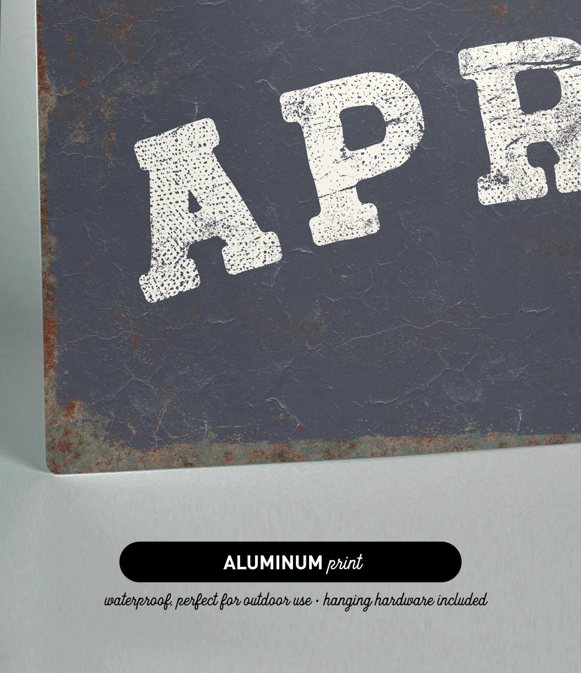 The image is an aluminum print with the text "APR" in white letters on a dark background.