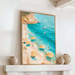 a framed painting of a beach scene with people enjoying the sun and the ocean, along with several umbrellas and boats in the water.
