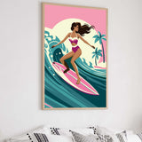 A framed illustration of a woman surfing on a pink surfboard against a colorful background.