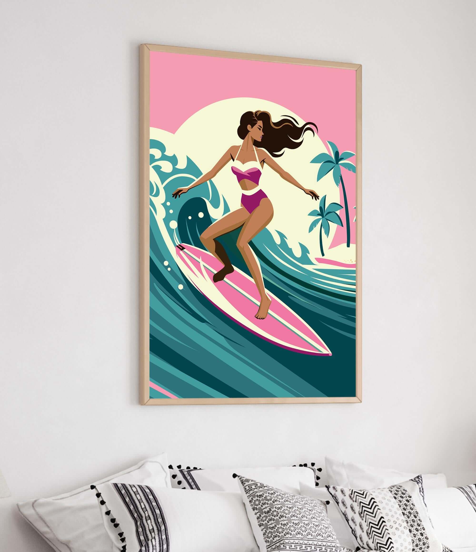 A framed illustration of a woman surfing on a pink surfboard against a colorful background.