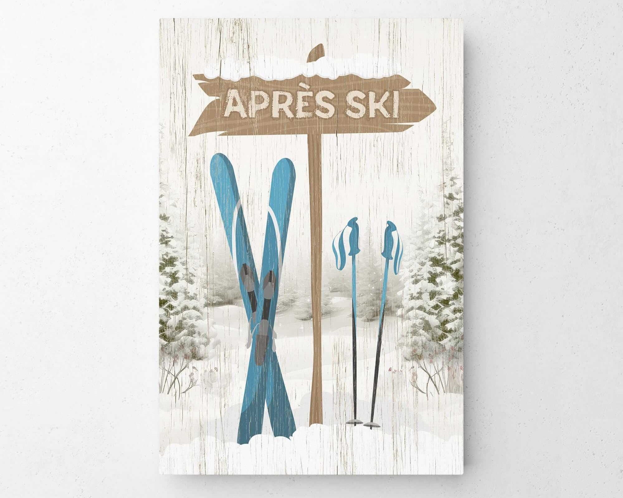 The Cerulean Après Ski Signpost Wall Art features a vintage "Après Ski" sign next to blue skis and poles with snowy trees—perfect mountain lodge decor.