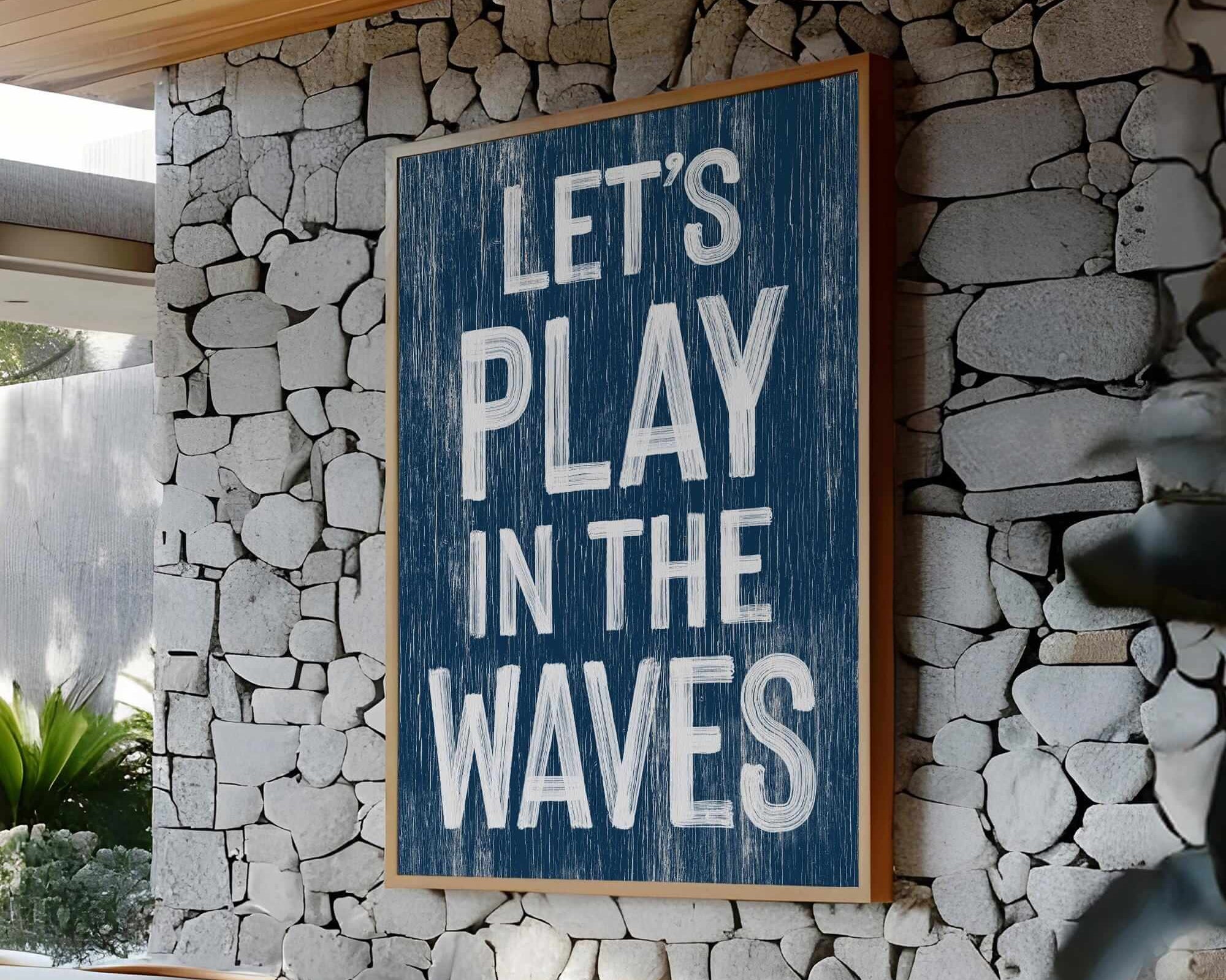 a sign that reads let's play in the waves