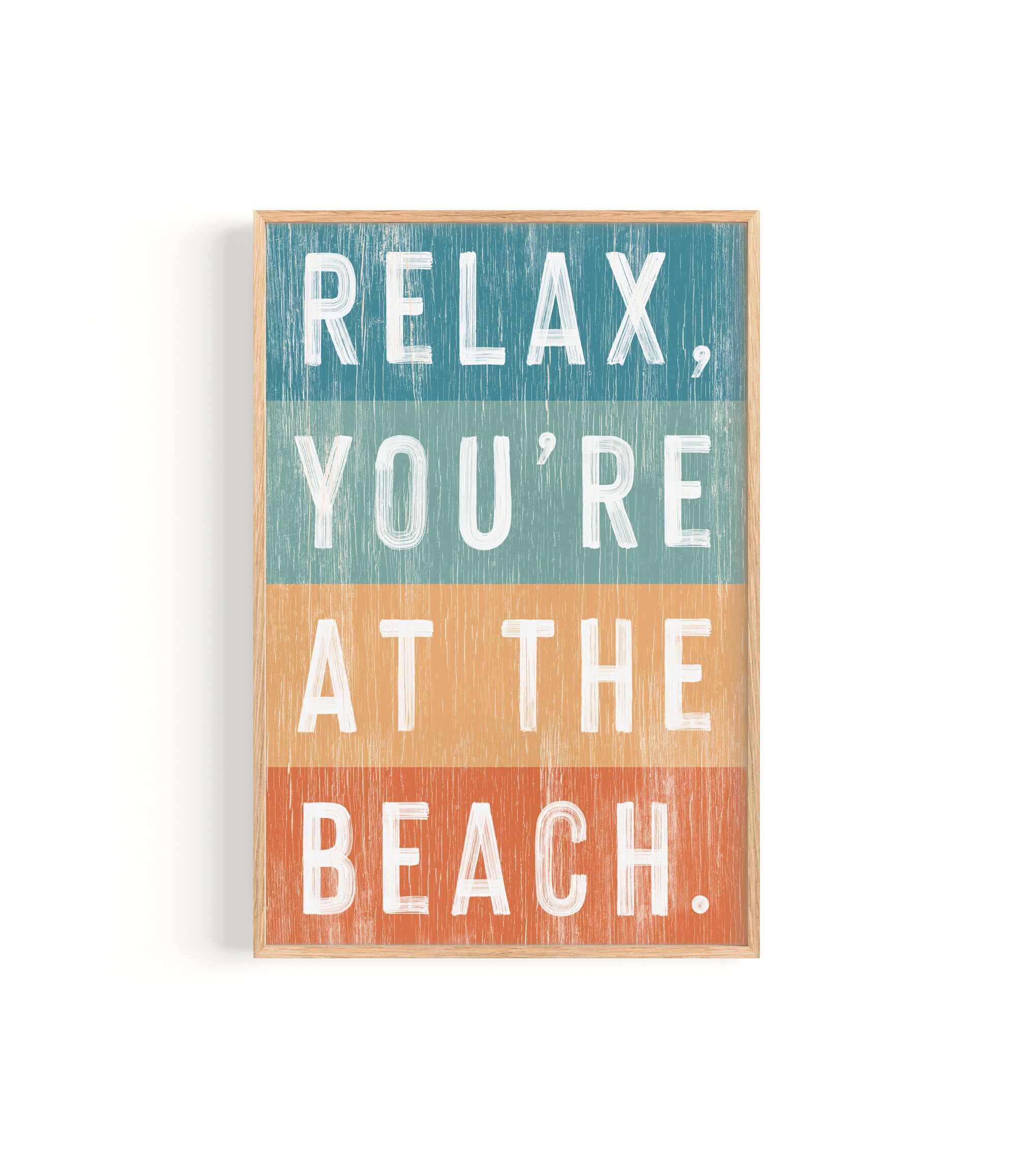 a wooden sign that says relax you're at the beach